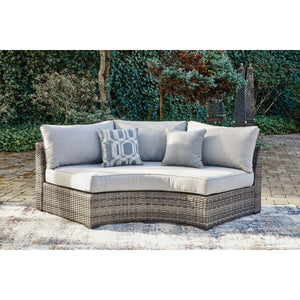 Montauk Curve outdoor curved loveseat in gray all-weather wicker — view 1