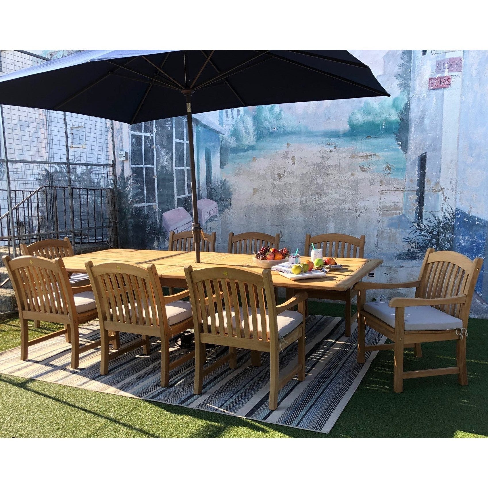 Tista Teak Armchairs with cushions — outdoor dining setting