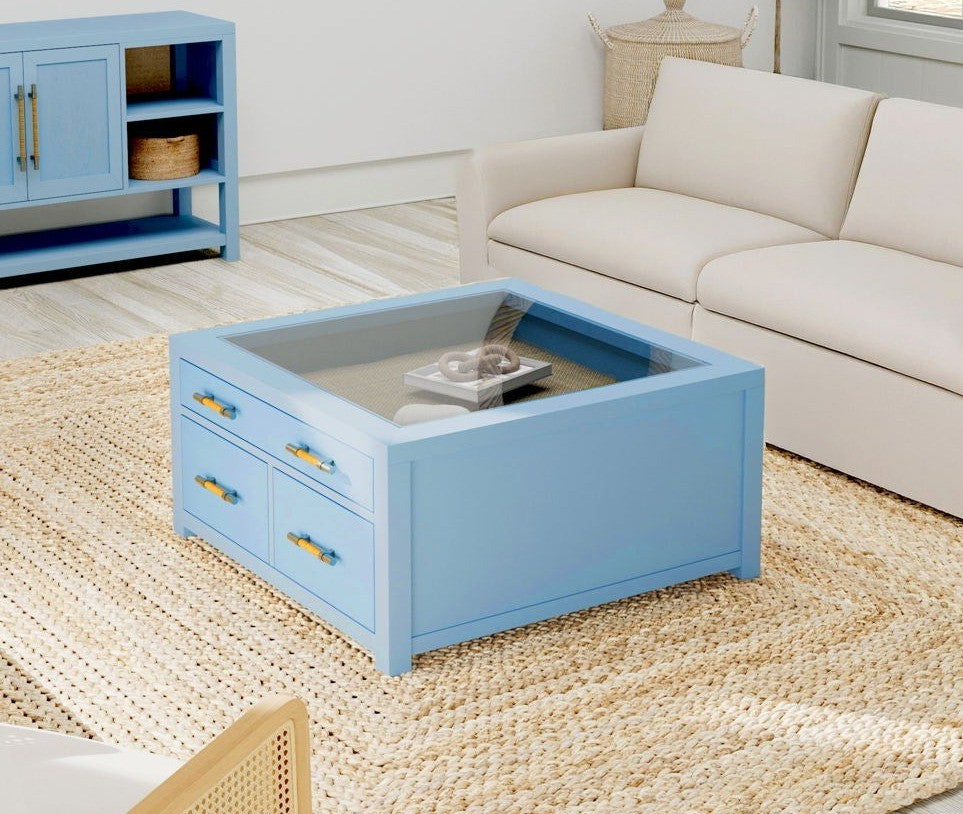 Blue collector coffee table glass display top close
