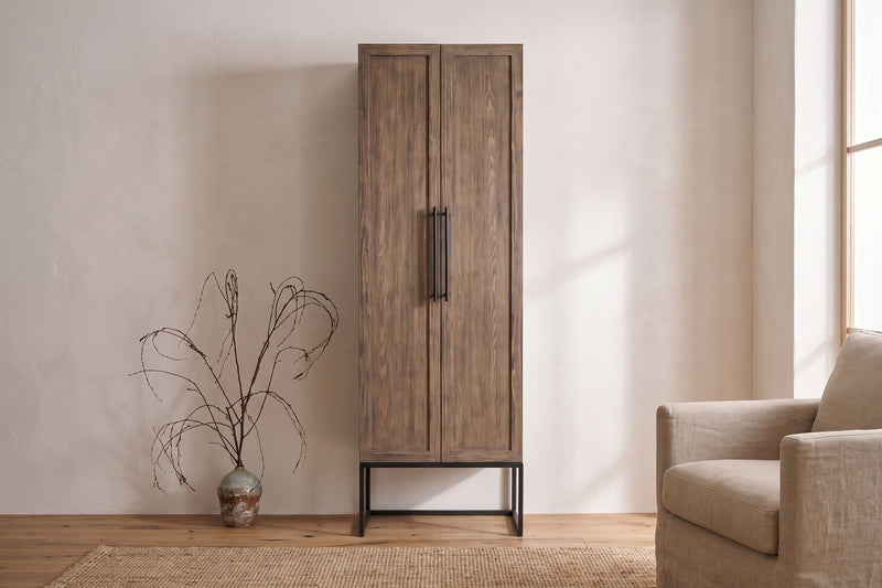 Dwell Latte 85-inch utility cabinet with solid wood doors in a living room