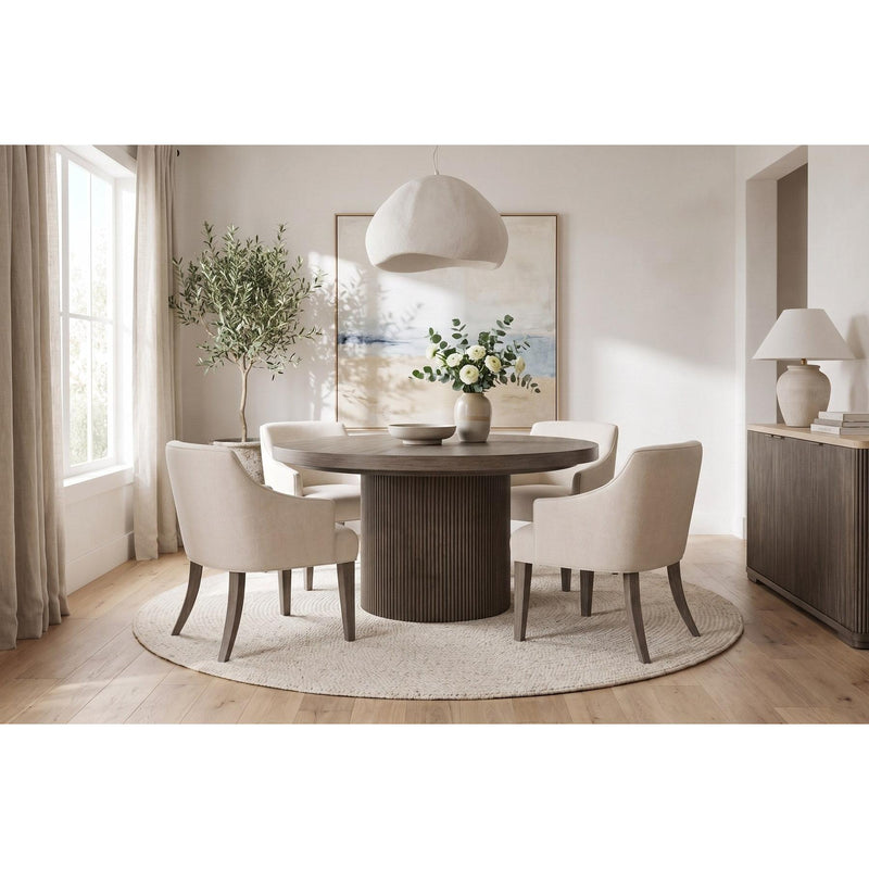 Reeded 60 inch round dining table with four Sariel upholstered arm chairs