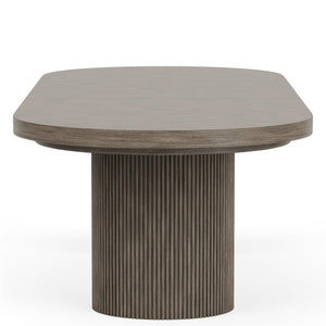 Sienna dining table end view showing rounded top and reeded pedestal — view 6