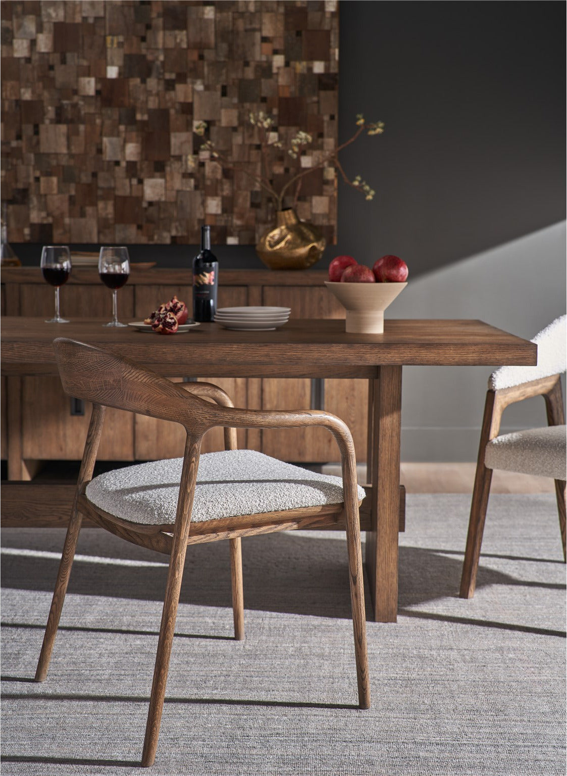 Echo dining arm chairs in Medium Brown Oak at the Eden solid oak dining table in a modern dining room