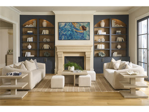 Universal Renya 101" curved sofa in Yukon Sand, shown as a facing pair in a fireplace living room — view 2