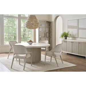 Carmen white oak round dining table with four upholstered arm chairs — view 1
