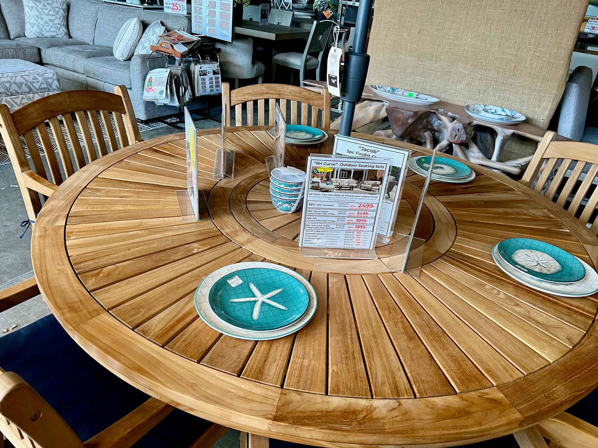 Komodo Teak 7pc Outdoor Dining Set (Teak 70&quot; Round Table w Built-in Lazy Susan with 6 Teak Tista Armchairs +FREE Cushions +FREE Umbrella +FREE Cover)