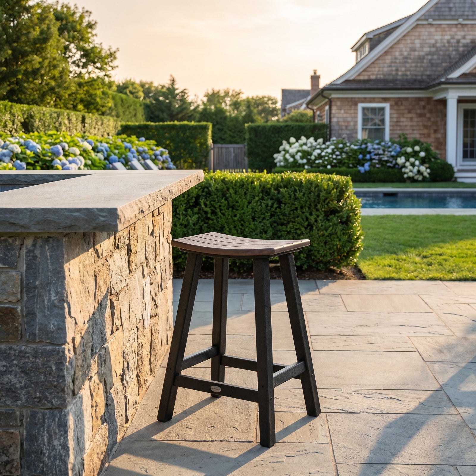 Polywood Contempo 24" Counter Stool - Two-Tone on a Long Island bluestone patio