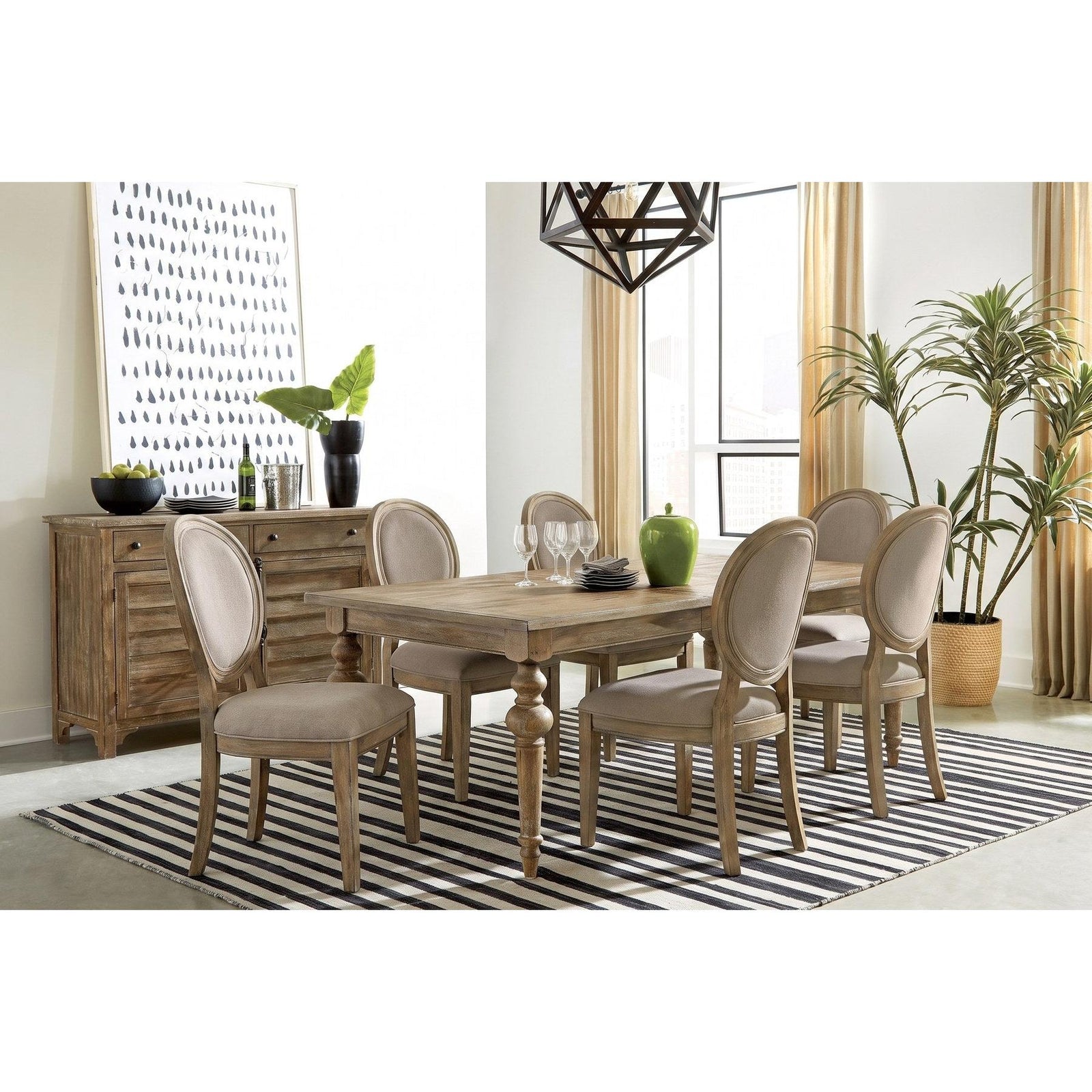 Flagstaff extension dining table with six oval-back upholstered side chairs