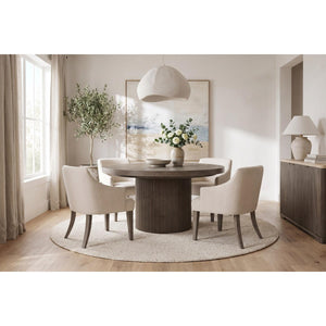 Reeded 60 inch round dining table with four Sariel upholstered arm chairs — view 1