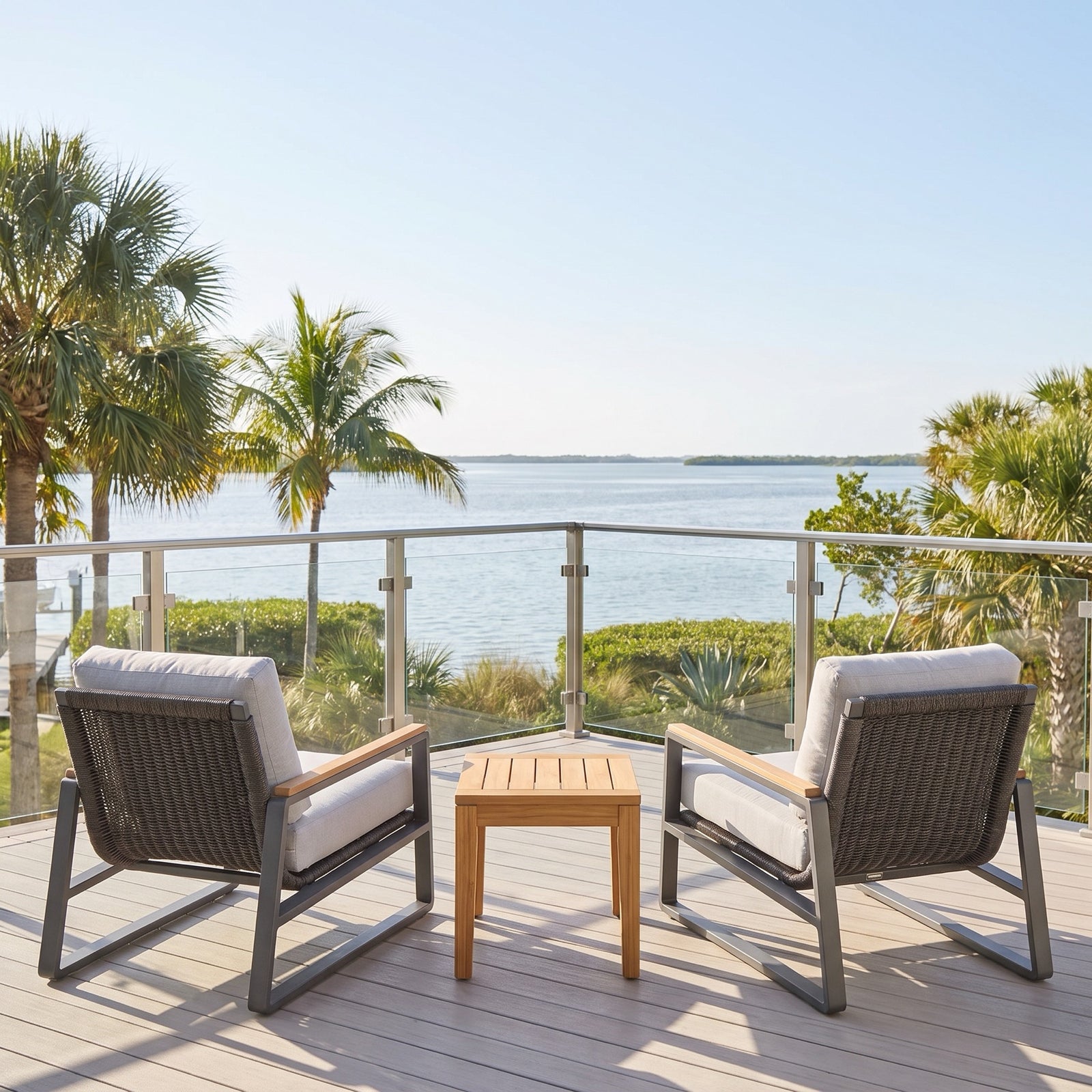 San Clemente 3-piece balcony set - two lounge chairs and a Karimun solid-teak side table on a coastal balcony